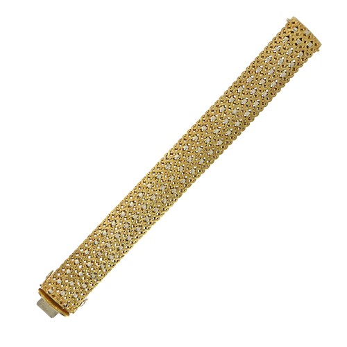 Latticework strap bracelet by Cartier, the openwork mesh with textured finish, applied polished circle dots along the middle, testing as 18ct gold,